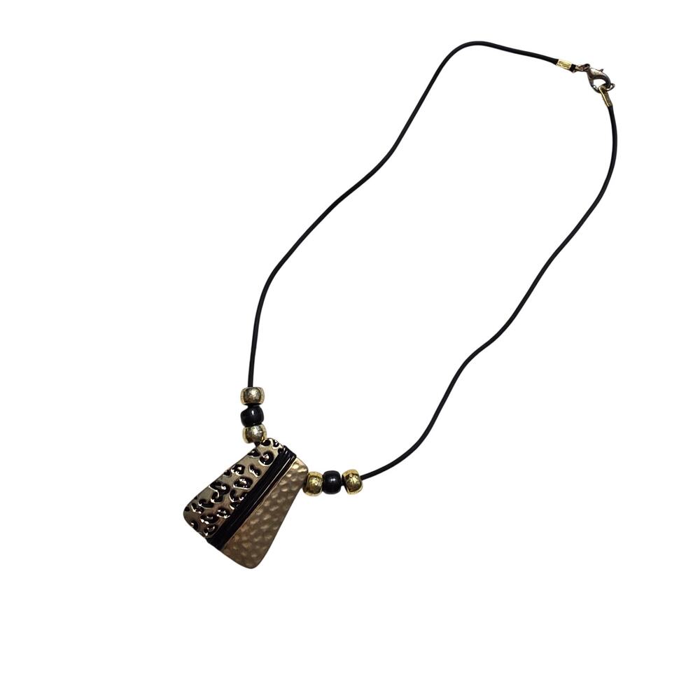 custom black cord necklace features a hammered gold-tone pendant necklace